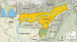 Assam highlighted on the political map of India showing neighboring states, international borders, Dispur, Guwahati, and the Brahmaputra River.