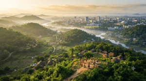 Aerial view of Tripura featuring lush green hills, forests, rivers, Agartala city, and the state's scenic natural beauty