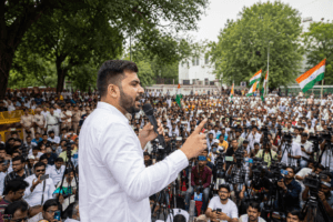 Abhijeet Dipke addressing supporters during the Delhi Protest 2026.