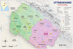 Political map of Uttarakhand showing 13 districts, Dehradun, Bhararisain, Garhwal, Kumaon, neighbouring states, and international borders.