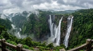 Jog Falls cascading down high rocky cliffs surrounded by Western Ghats forests